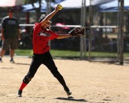 Young girl pitching