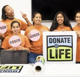 Pink Club Students with Donate Life Sign